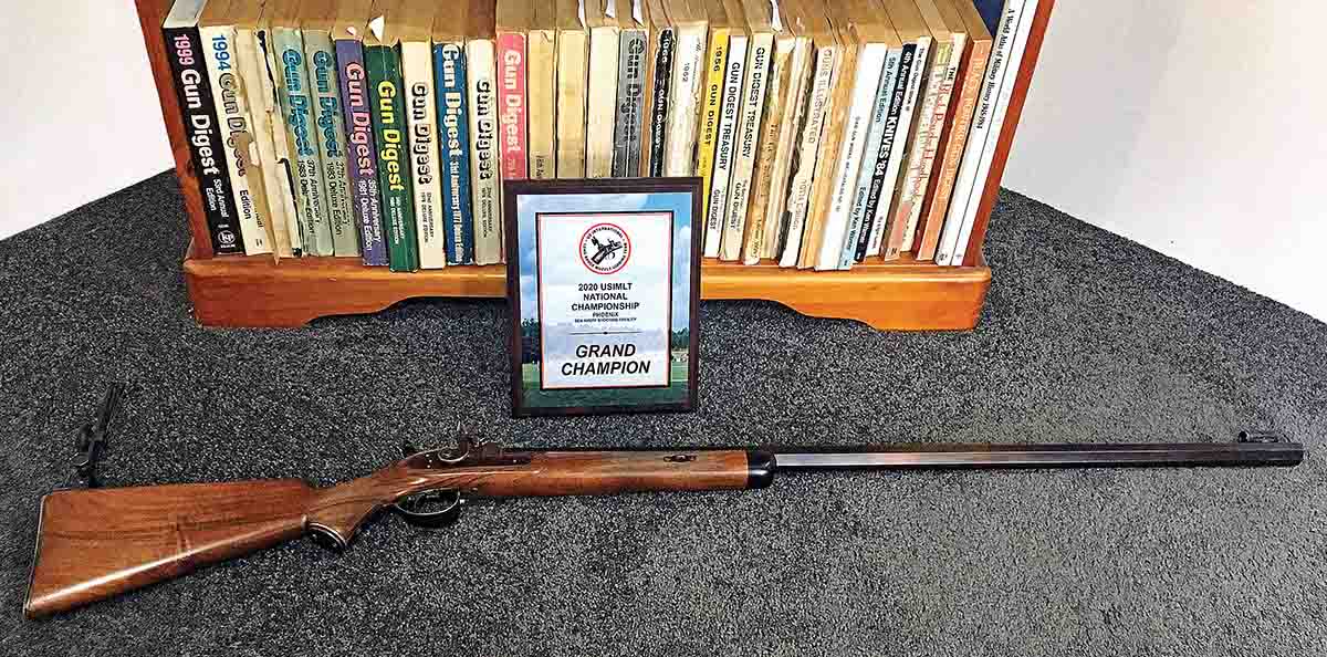 Laurie Kerr’s .40 caliber long-range muzzleloader with first place plaque from the 2020 United States Muzzleloading Championship. Note the heel-mounted tang sight for shooting from the back position.